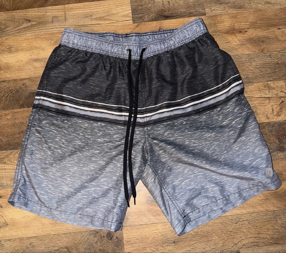 Calvin Klein men’s grey& black swim trunks